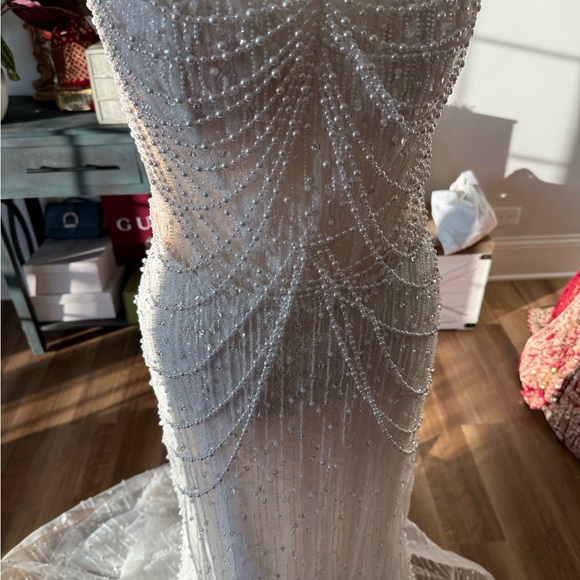 Elegant White Beaded Wedding Gown - Picture 8 of 13